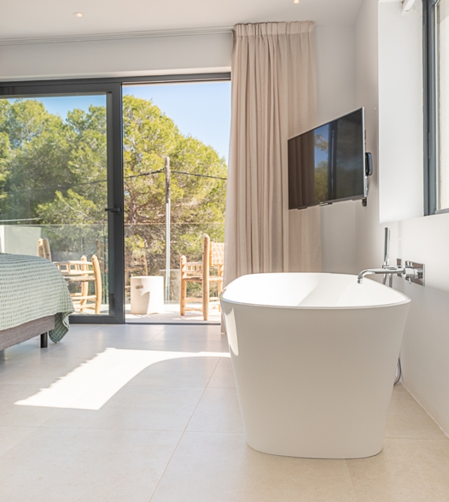 Resa estate modern villa for sale ibiza first line north tub bedroom.jpg